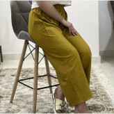 شلوار لینن زنانه فری سایز تا 46 رنگی کرم چهارفصل تنخور شیک و راحت بدون سایه اندازی