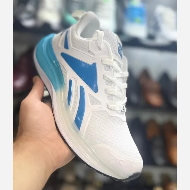 کفش دوخت اشتروبل مردانه ریبوک جنس رویه لژ شیشهای فوم اسپیسر زیره ایربولینگ لاستیک سایز 41 تا 44