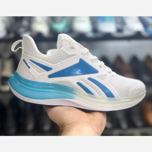 کفش دوخت اشتروبل مردانه ریبوک جنس رویه لژ شیشهای فوم اسپیسر زیره ایربولینگ لاستیک سایز 41 تا 44