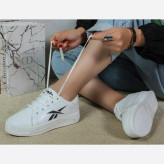 ونس ربوک زنانه سفید و مشکی رویه چرم صنعتی زیره پلیمر سایزبندی 37 تا 40